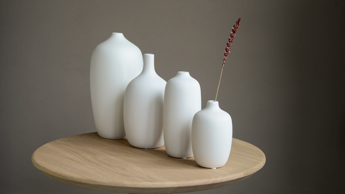 matt white ceramic vases in a range of sizes and shapes