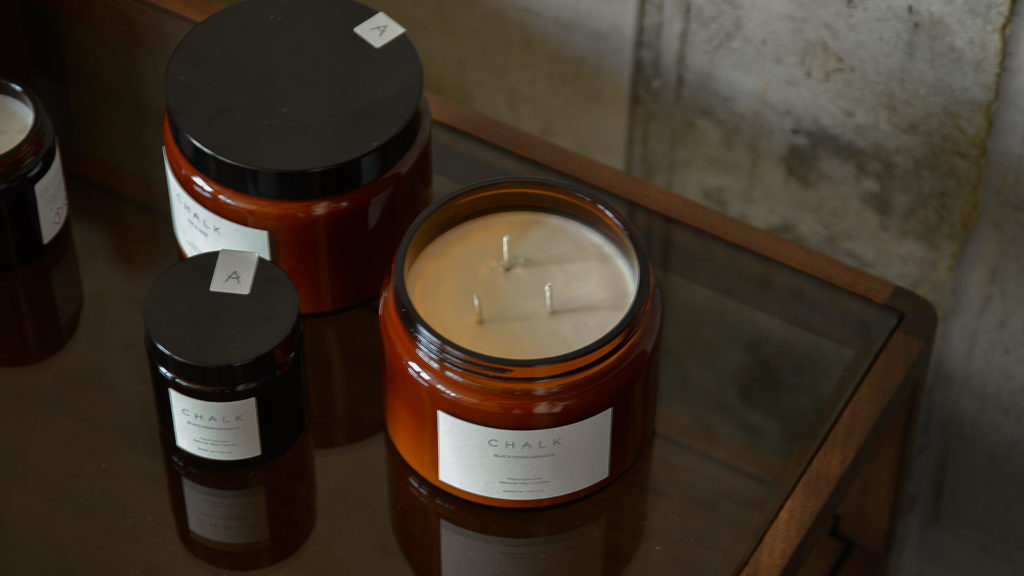 scented candles in amber coloured jars