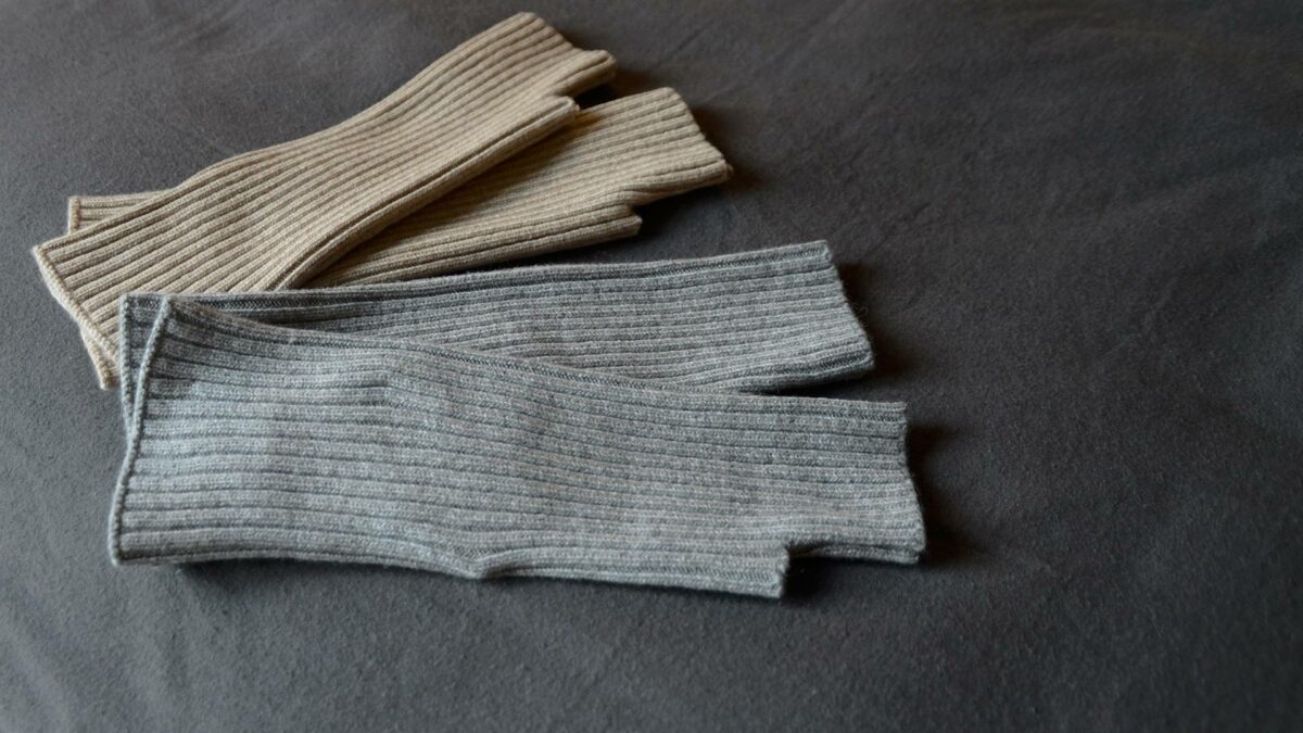 soft ribbed knitted wrist warmers in grey marl and stone