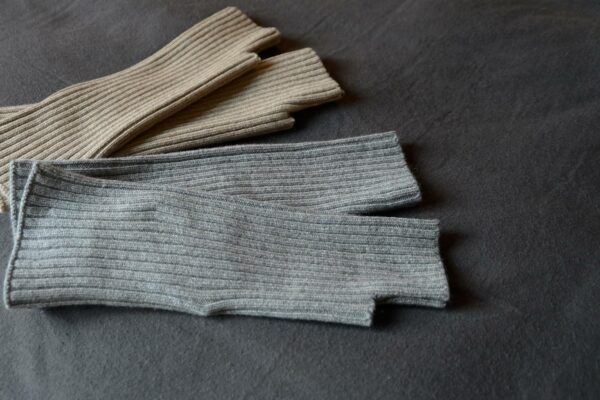 soft ribbed knitted wrist warmers in grey marl and stone