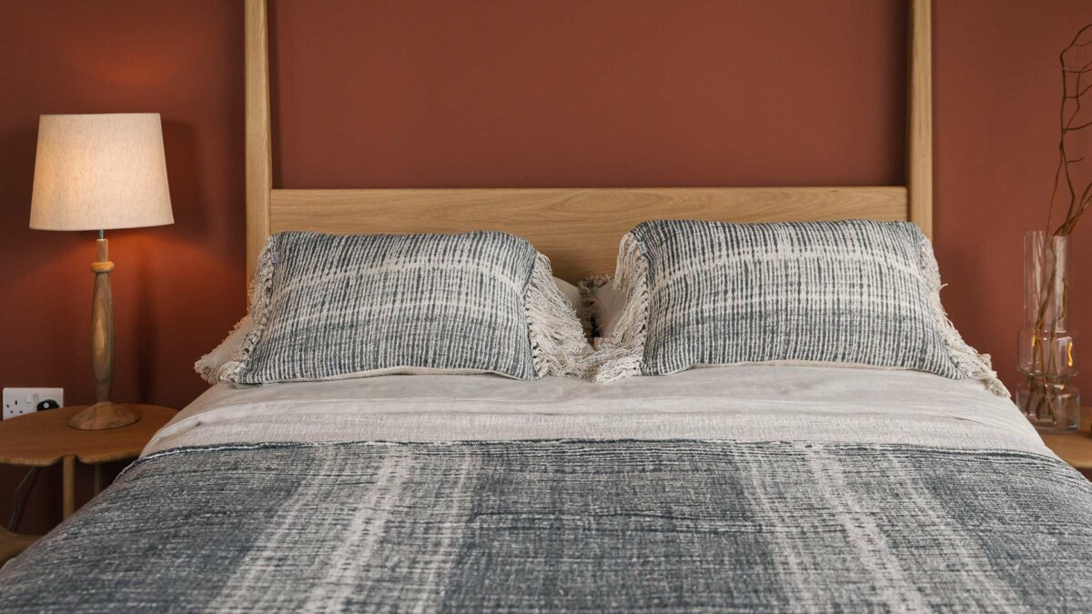 charcoal and ivory boho throw and cushions close up