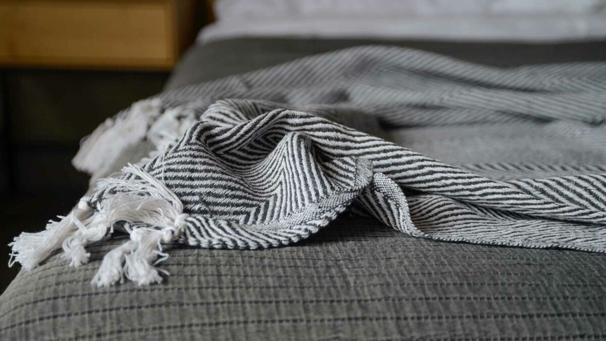 cotton rich throw made with recycled fibres