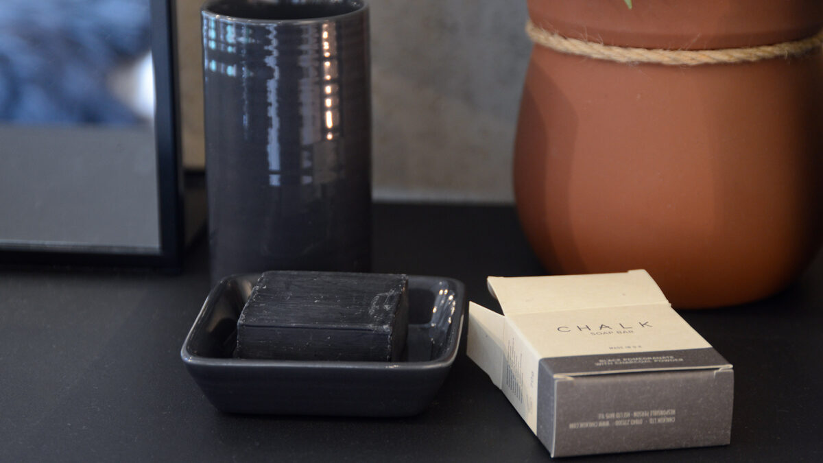 charcoal soap and dark grey ceramic bathroom acessories