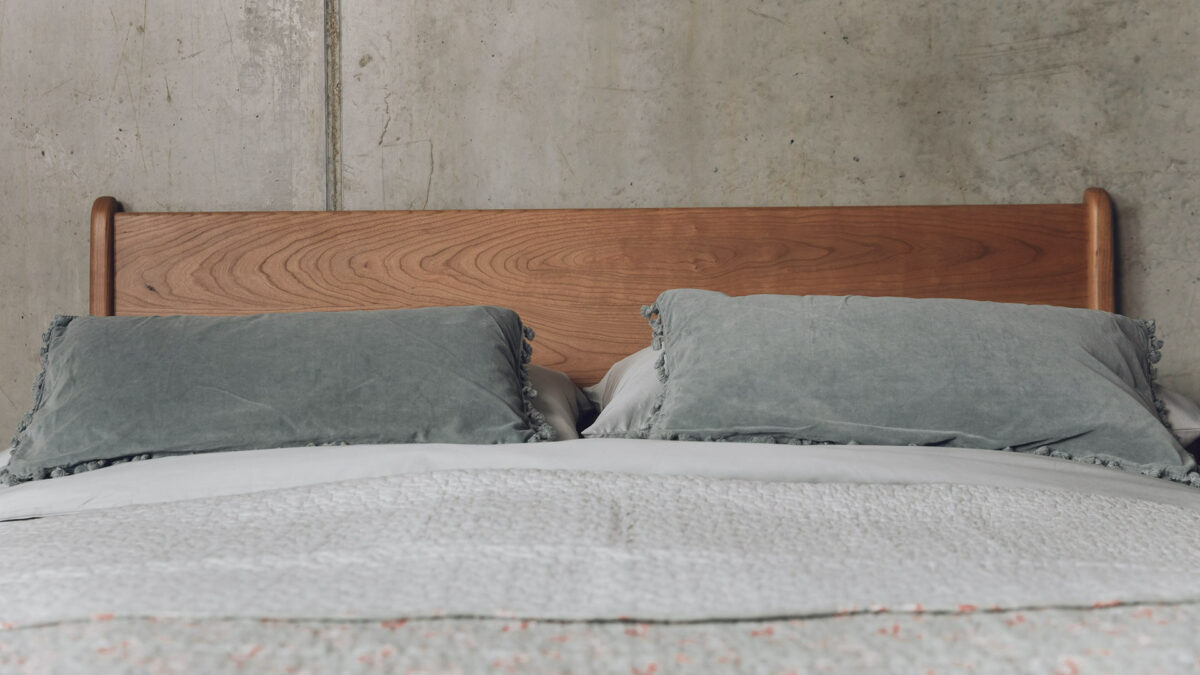 charry carnaby headboard with duck egg cushions