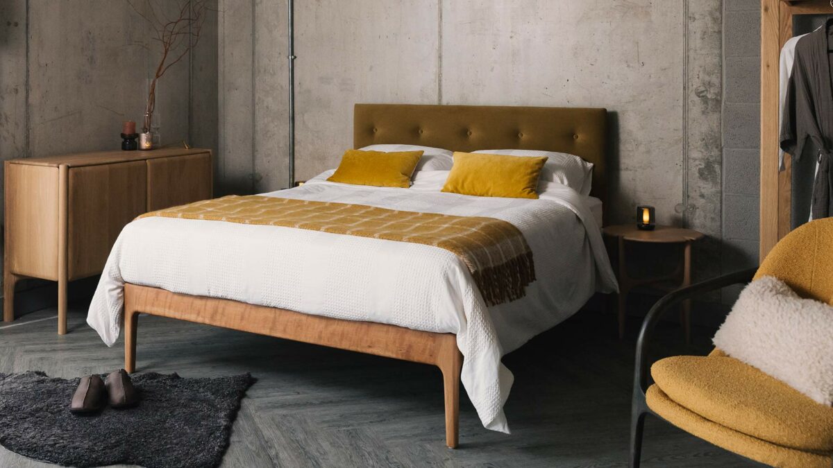 cherry bloomsbury bed with eco velvet upholstery and white and yellow bedding 1350