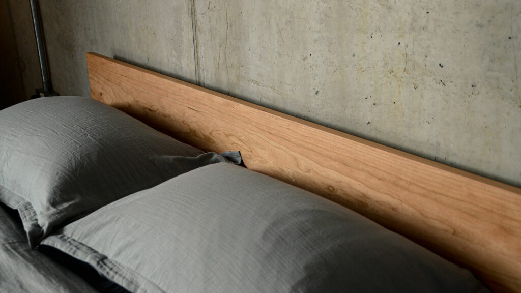 A closer look at the headboard of our king size cherry wood Sahara bed