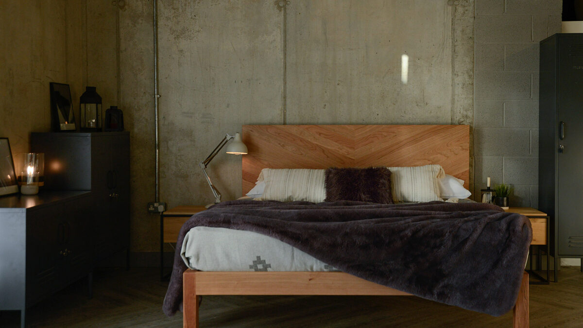 Hathersage a hipster style wooden bed with a tall parquet pattern headboard