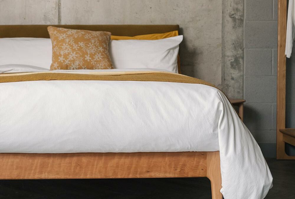 cheryy bloomsbury bed with white stonewashed cotton bedding portrait