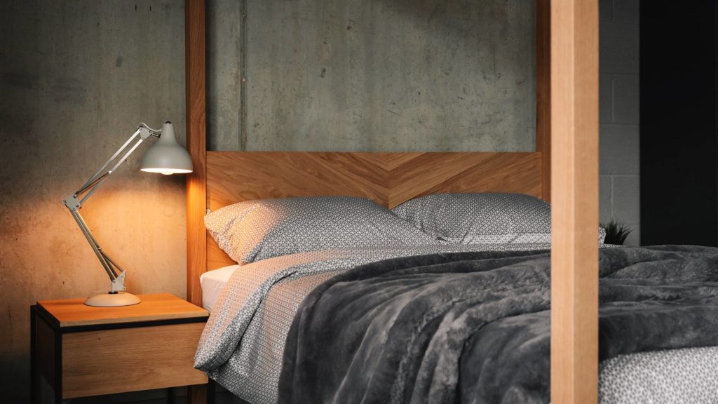 Grey cotton bedding on the contemporary solid wood Kelham 4 poster bed with parquet headboard