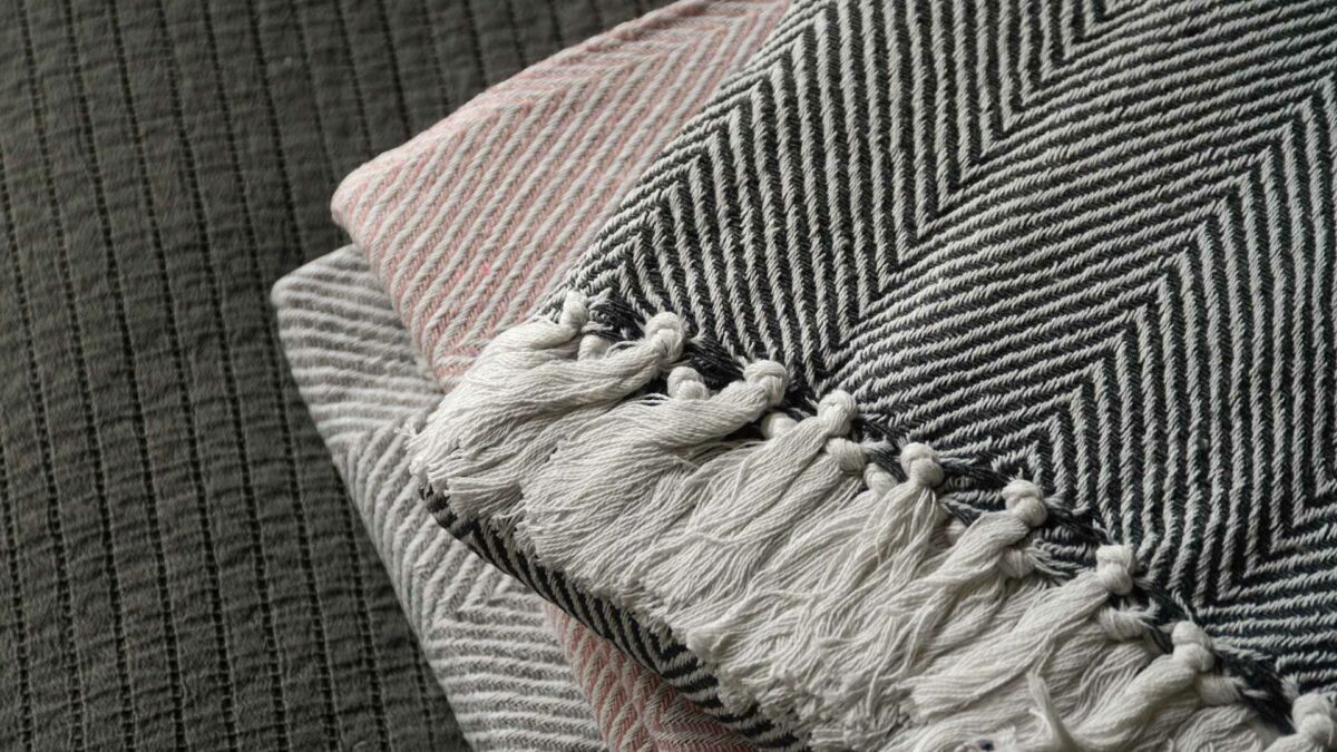 recycled fibres woven throws in 3 colour options, a close-up view