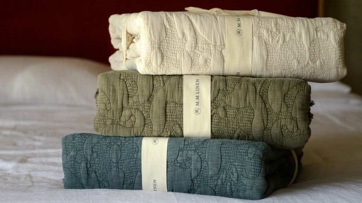 classic embroidered throws cream olive or storm blue