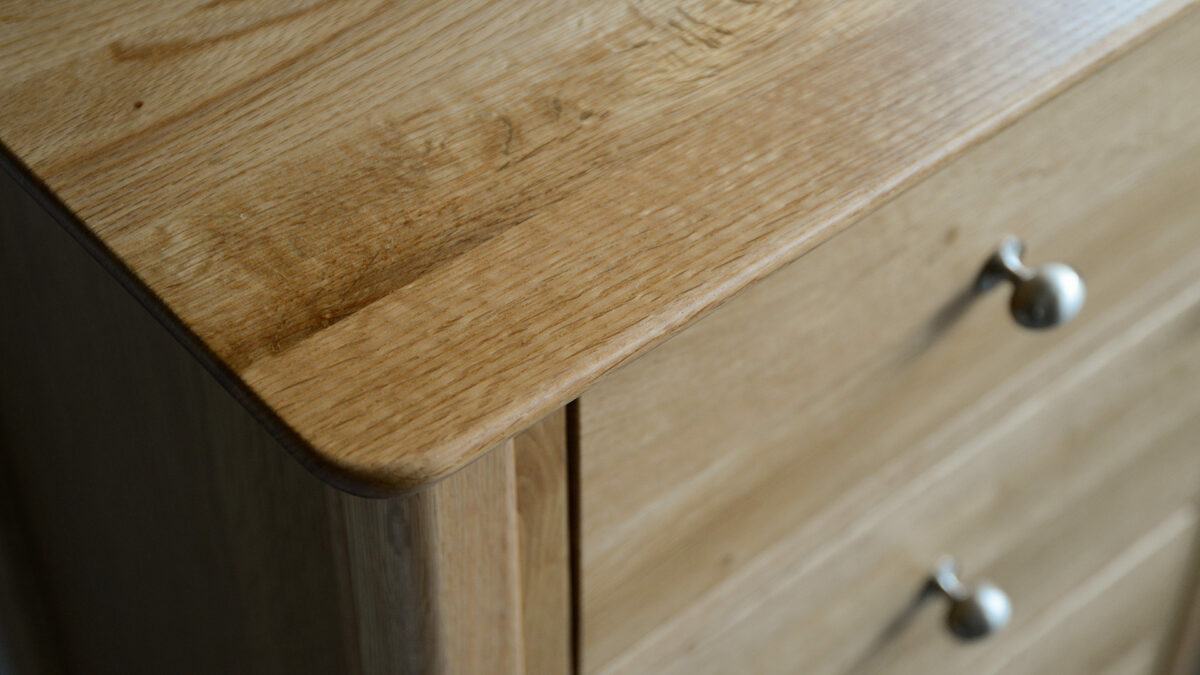 classic oak chest tall boy design curved top detail