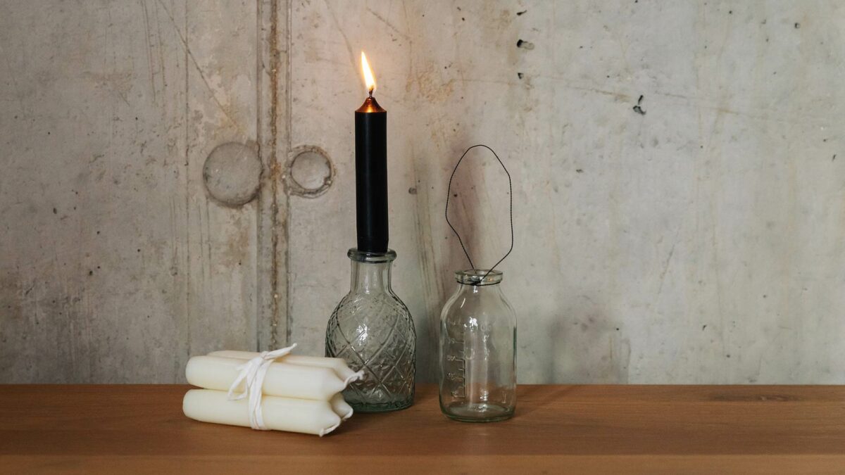 clear glass candle holders and small dinner candles