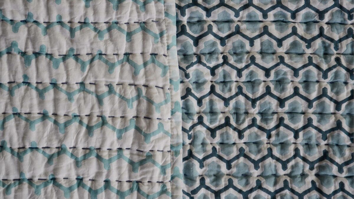 close up blue reversible hand printed cotton bedspread