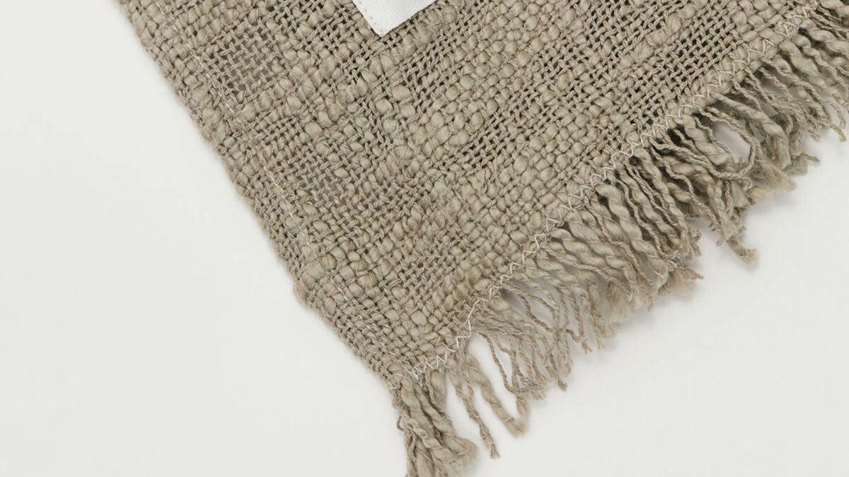 close up of textured cotton bedspread