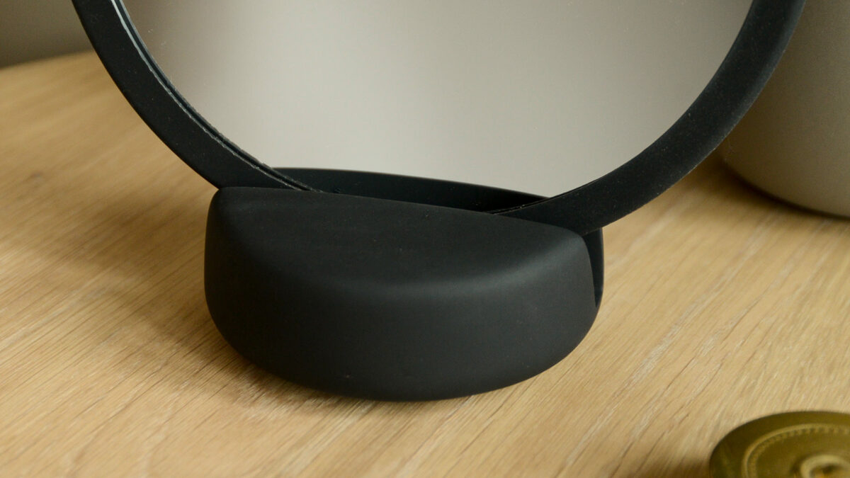 close up soft matte black mirror base