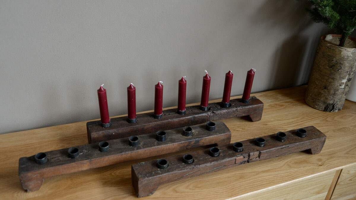 collection of rustic wooden candelabras