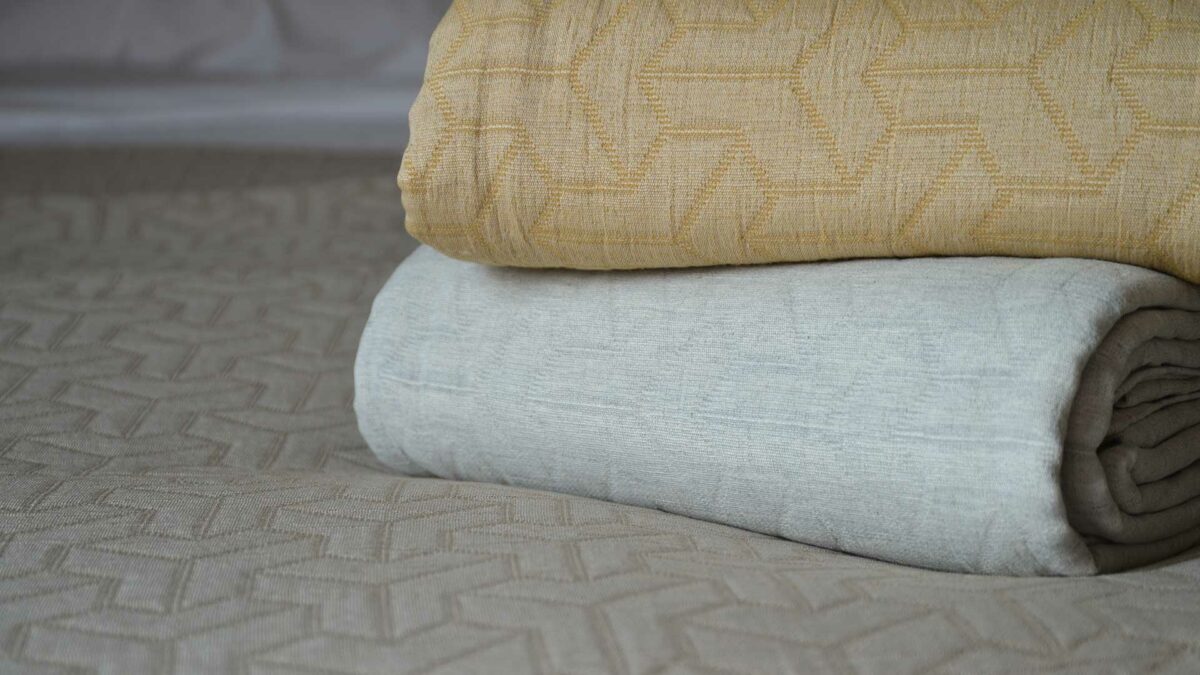 colour range of cotton rich bedspreads arrow pattern