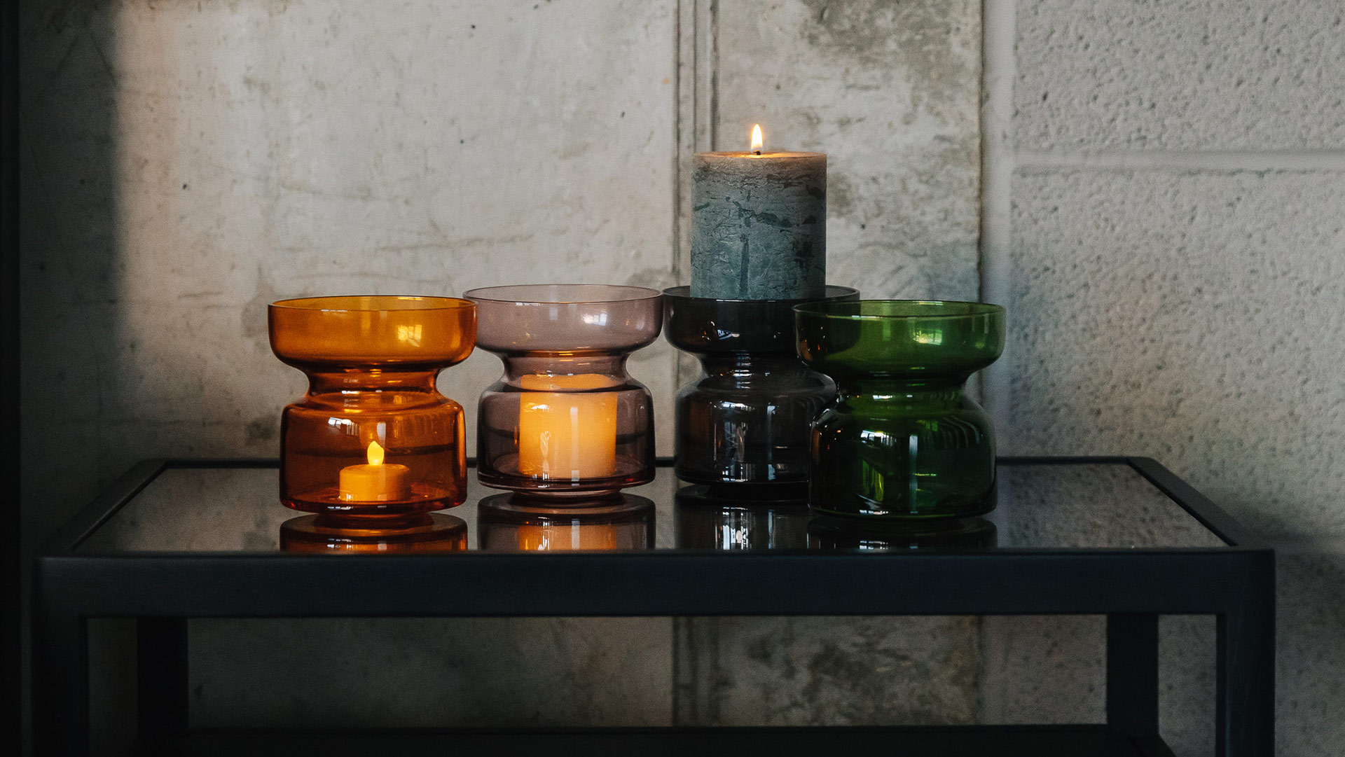 glass candle or tea light holders in a choice of colours