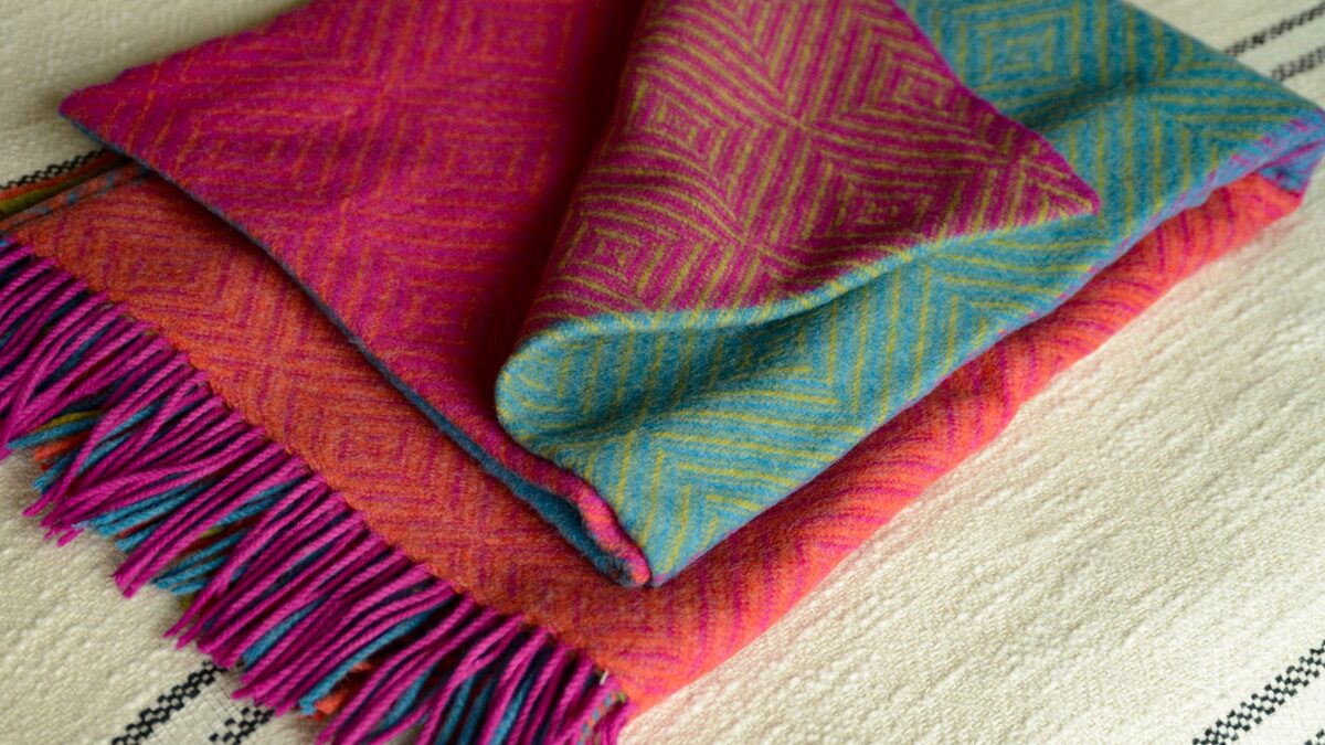 diamond weave merino wool throw in bright modern colour blocks