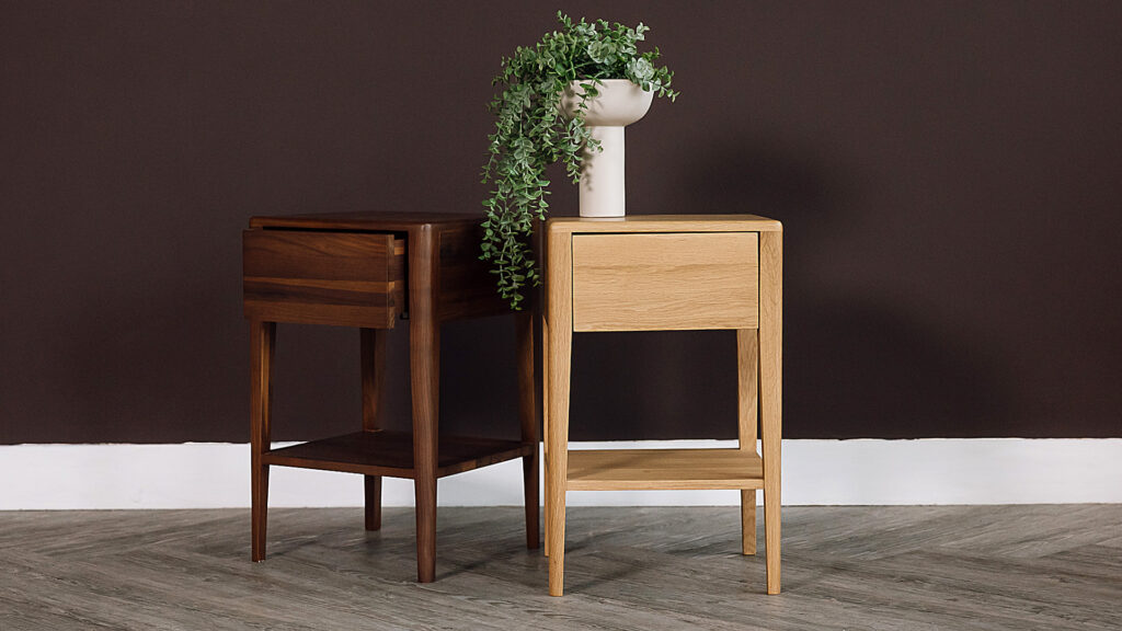 2 Compact bedside tables with deep drawers and low shelf. One oak, one walnut.