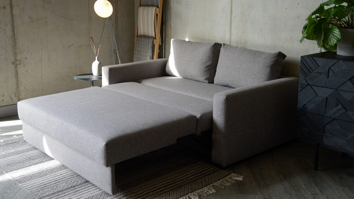 compact sofa bed expanded side view