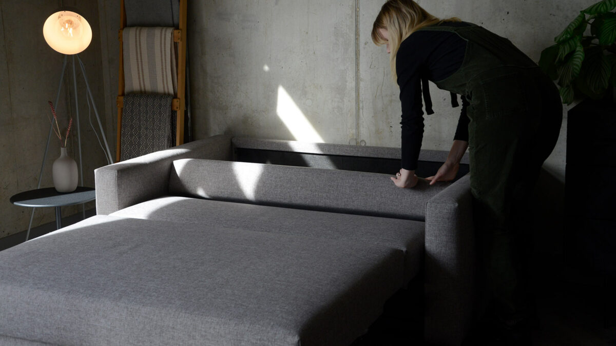 compact sofa bed lowering back rest