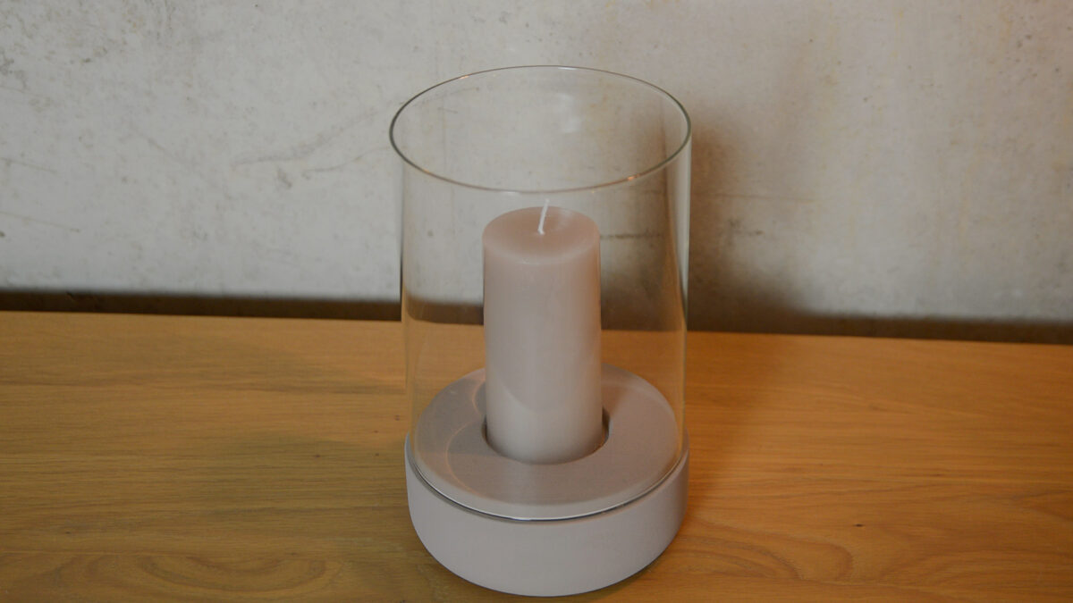 candle holder with a taupe concrete base