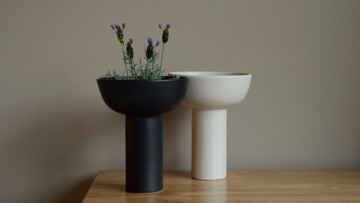 modern ceramic vases in ivory and black