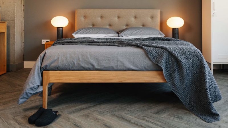 Scandinavian bedroom look - grey bedding on midcentury style Bloomsbury bed