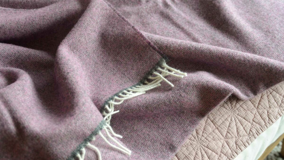 cool pink and grey marl wool throw