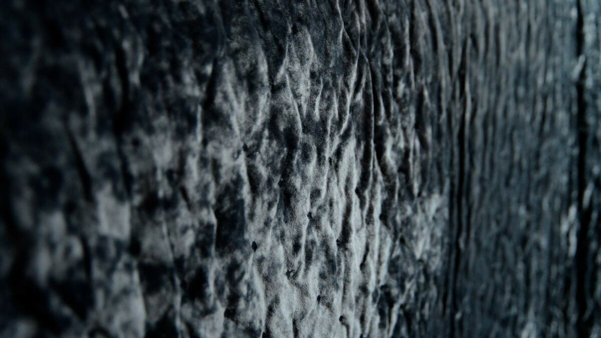 a closer view of our luxury crushed velvet bedspread in inky slate grey