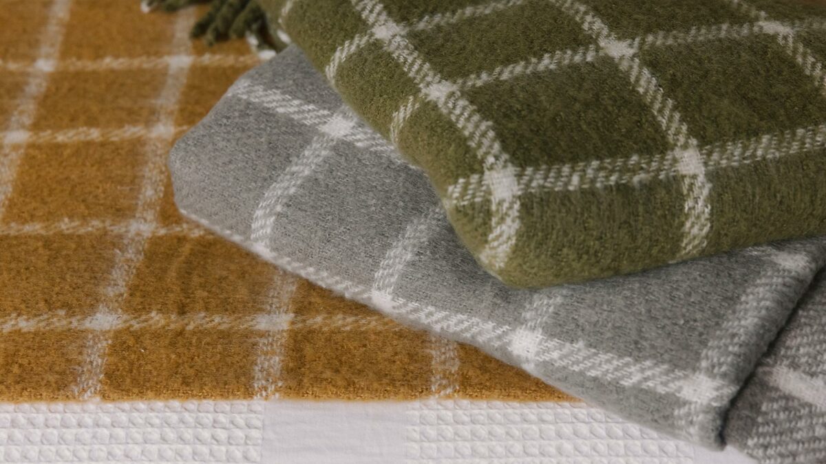 cosy check patterned throws 3 colours