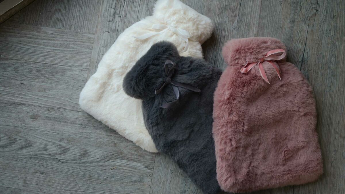 luxuriously soft faux fur covered hot water bottles in 3 colours