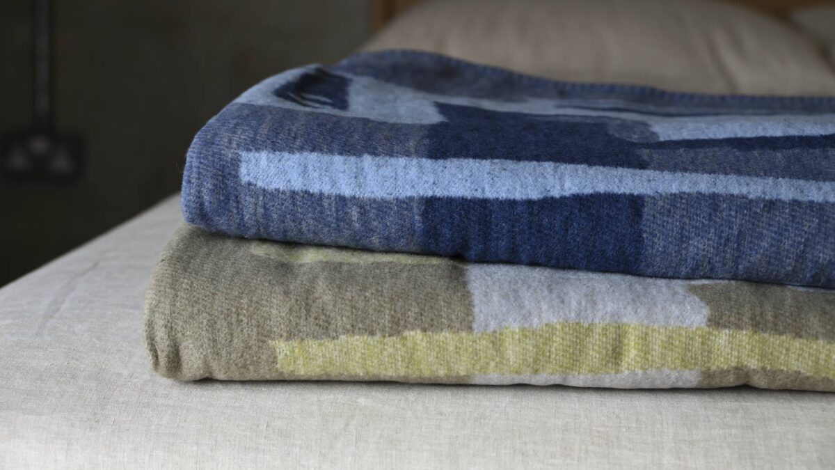 neatly stacked folded throws.