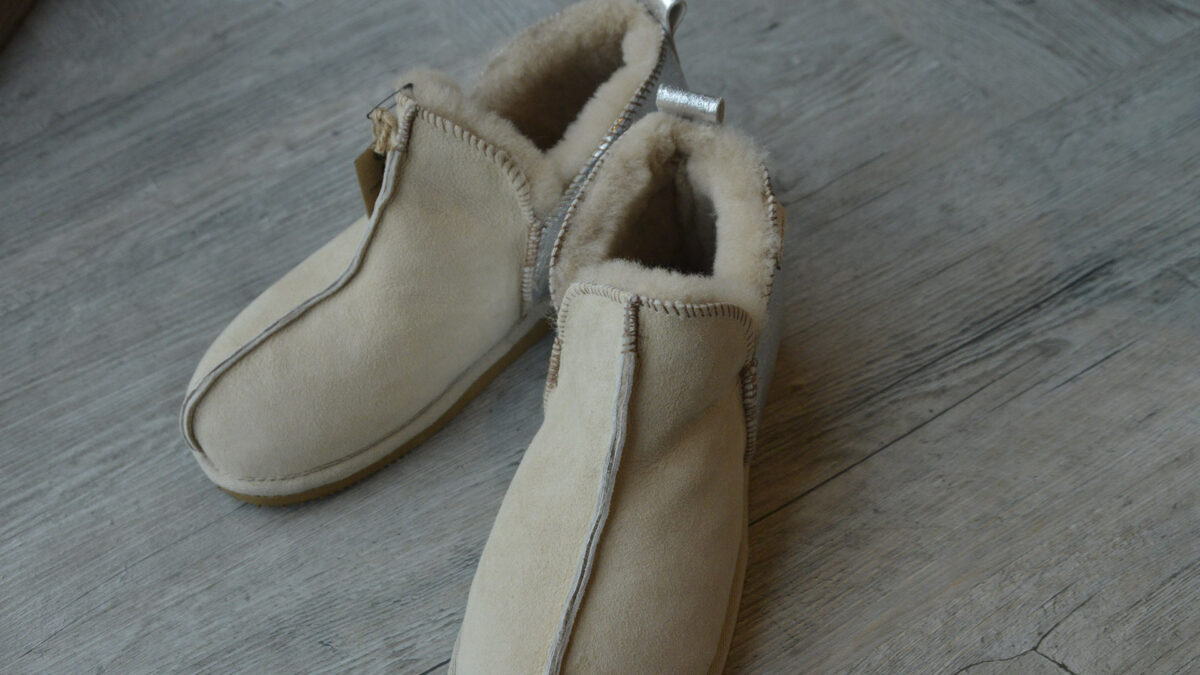 cosy boot style sheepskin slippers in sand with silver heels