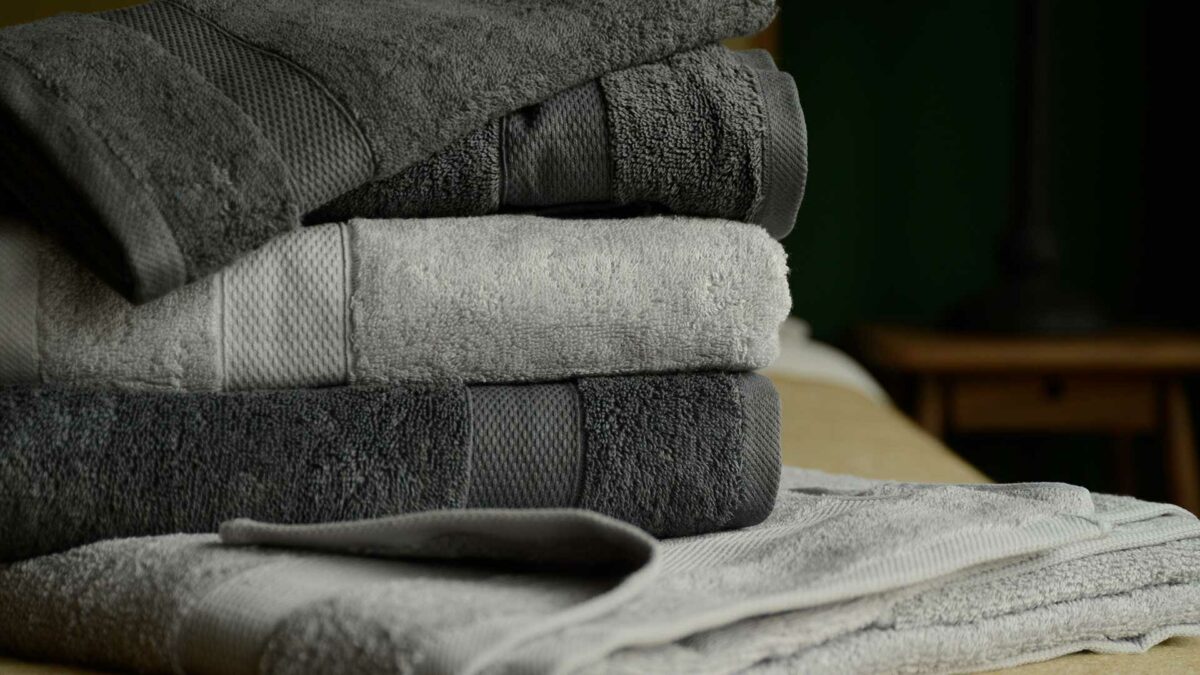 cotton terry towels in dark grey and light grey