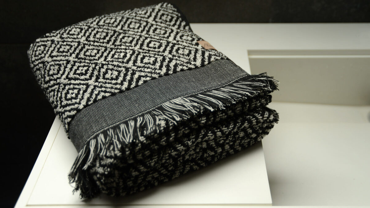 cream and black morocco towel with fringe edge