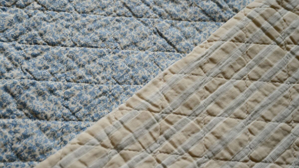 cream and blue printed quilts