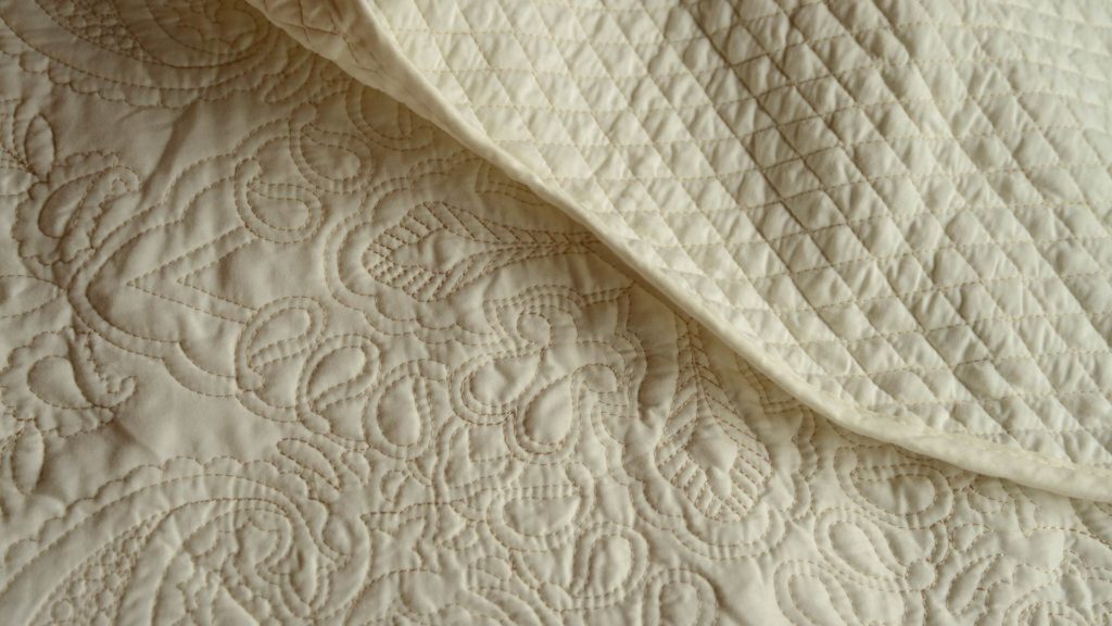 cream embroidered bedspread