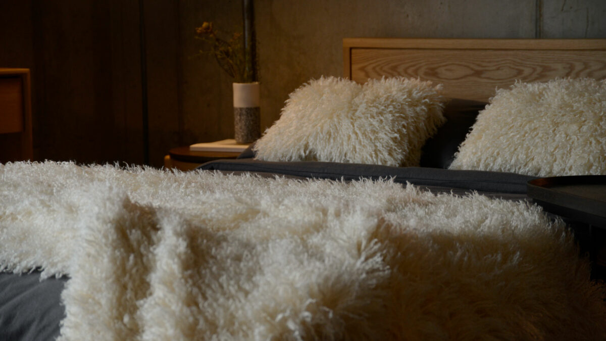 cream faux afghan cushions