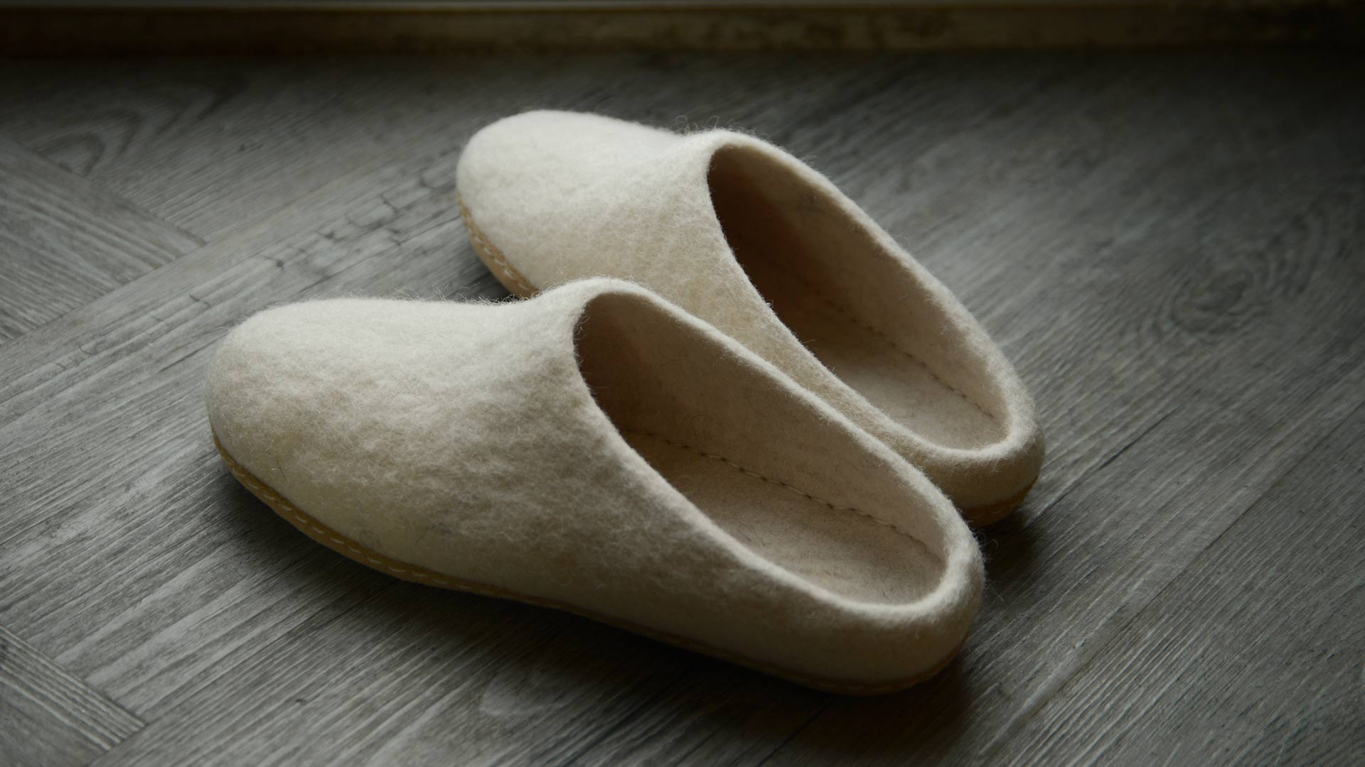 Wool slippers hotsell leather sole