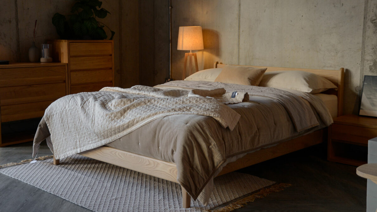cream textured throw on hazelnut bedspread