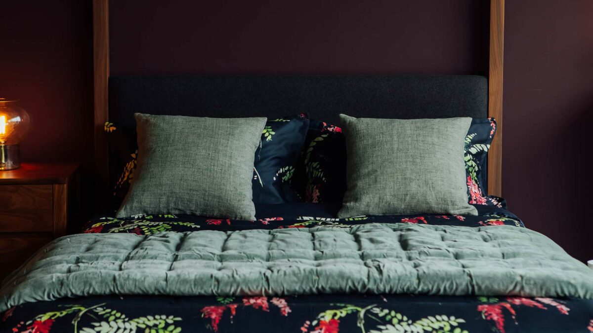 crimson-blossom-print-with-sage-green-velvet-quilt-and-cushions