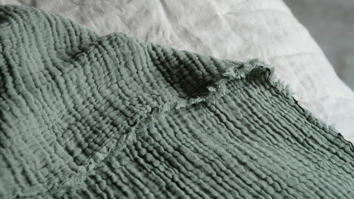 crinkle cotton throw in eucalytus detail
