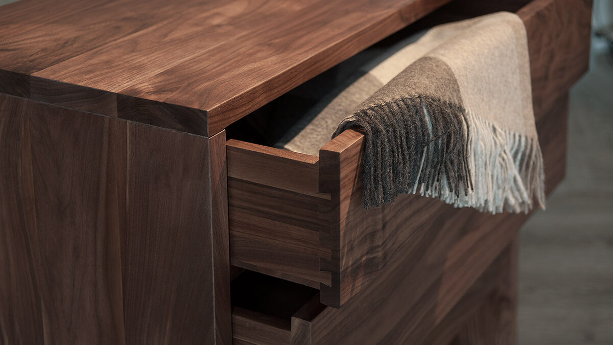 A close up view of the drawers in our Walnut storage chest by Black Lotus.