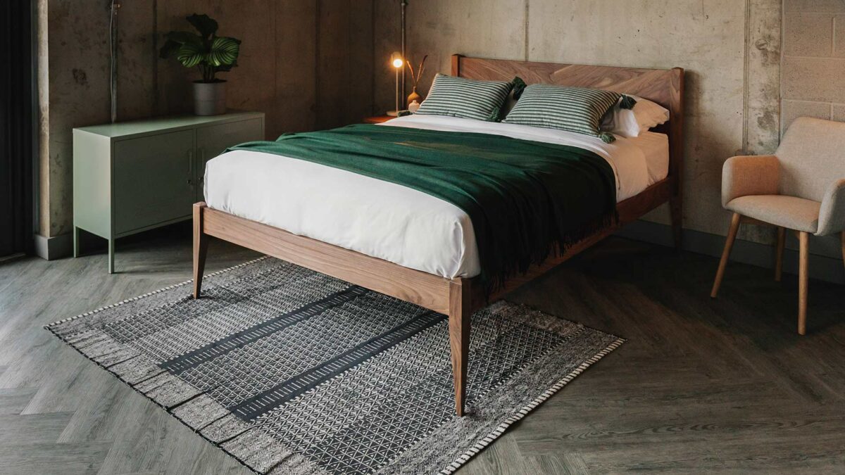 the Dalston is a classic taller bed hand made from solid wood, here it is in walnut