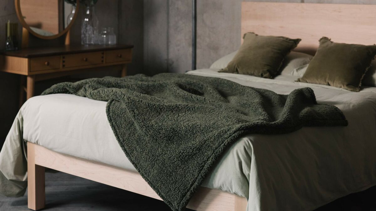 dark green fleccy throw
