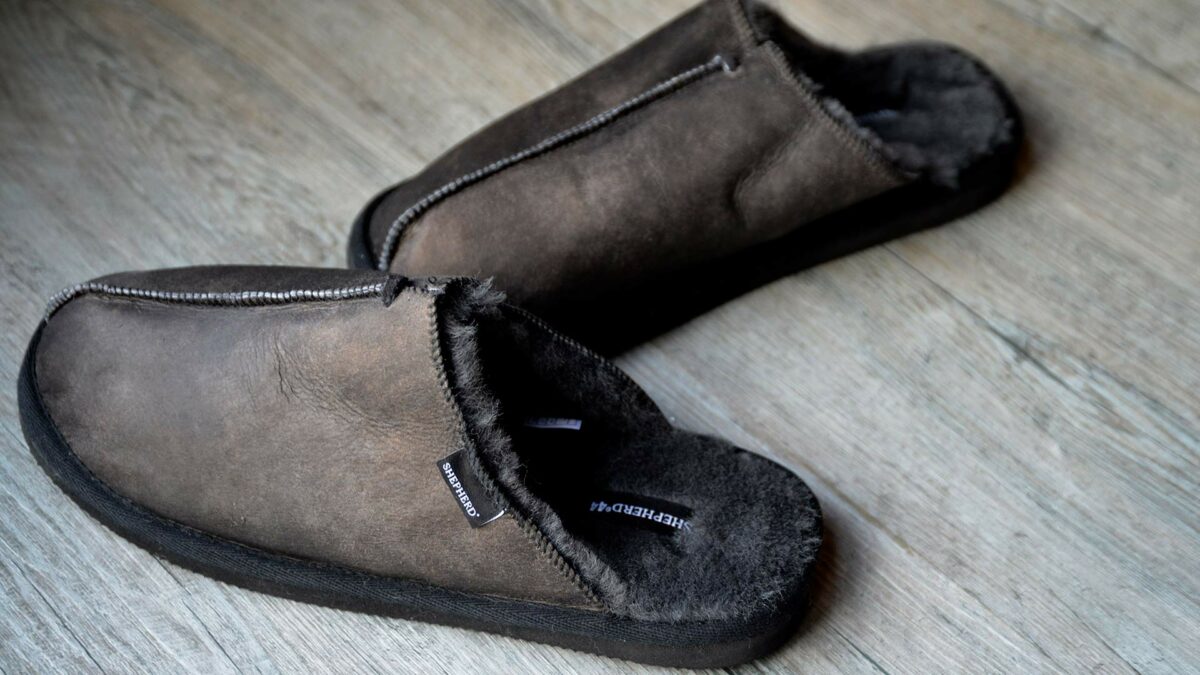dark grey and brown slippers with black sole