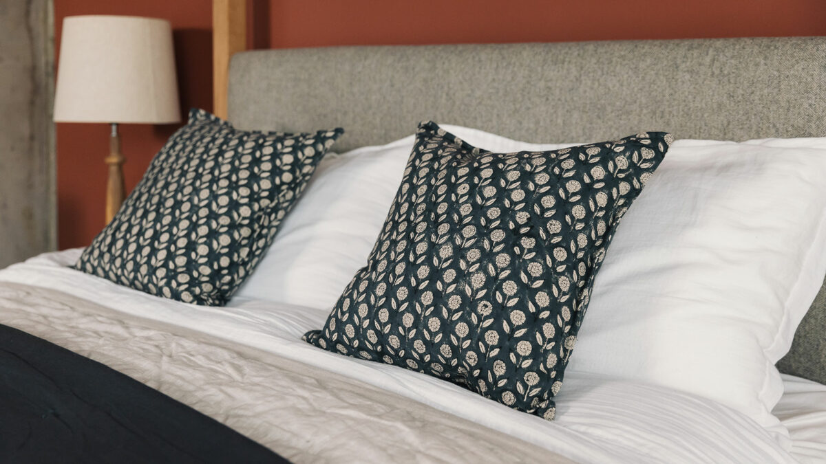 dark grey and ecru print cushions